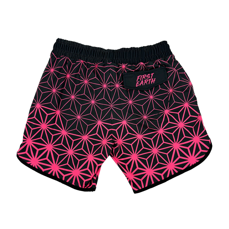 Asanoha pink UV shorts by First Earth – rave-ready shorts with glowing sacred geometry design under blacklight, soft breathable fabric, zip and velcro pockets for hands-free flow