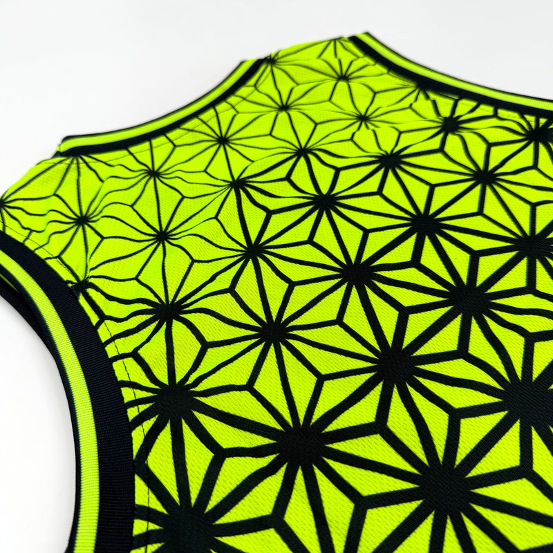 Asanoha yellow UV basketball jersey by First Earth – breathable rave jersey with glowing Asanoha geometric pattern on mesh fabric
