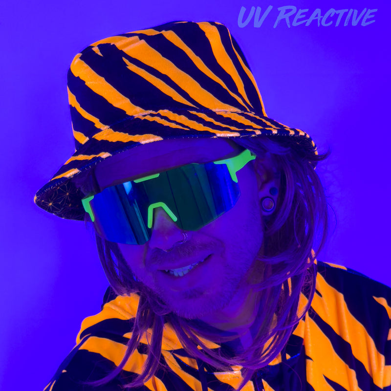 First Earth Sacred Stripes UV velvet bucket hat glowing orange under UV blacklight
