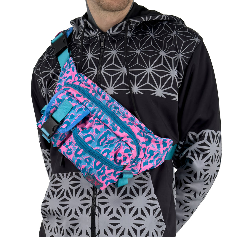First Earth Neon Cheetah Cross Body Bag — neon cheetah-print UV rave bag that glows under blacklight and stays secure while you’re spinning and dancing.