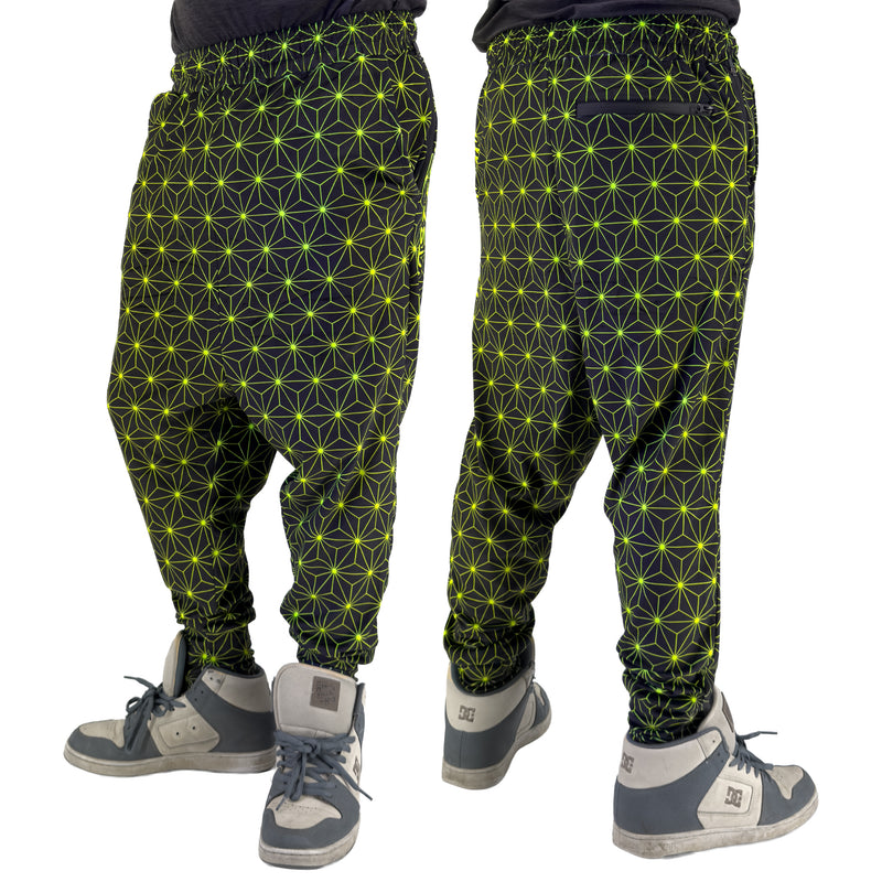 First Earth Asanoha Yellow velvet harem joggers on model showing front and back views with yellow geometric asanoha pattern