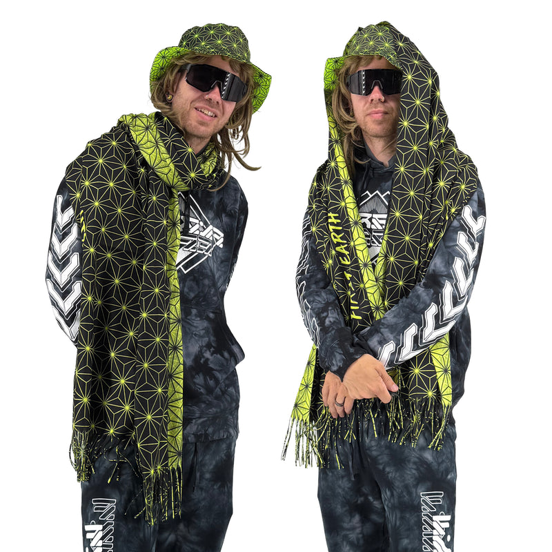 Asanoha yellow pashmina by First Earth – cozy, festival-ready wrap with glowing sacred geometry pattern, ideal for layering in rave environments