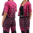 Asanoha pink UV crop baseball jersey by First Earth – cropped rave tee that glows under blacklight, featuring delicate Asanoha geometry on breathable fabric 