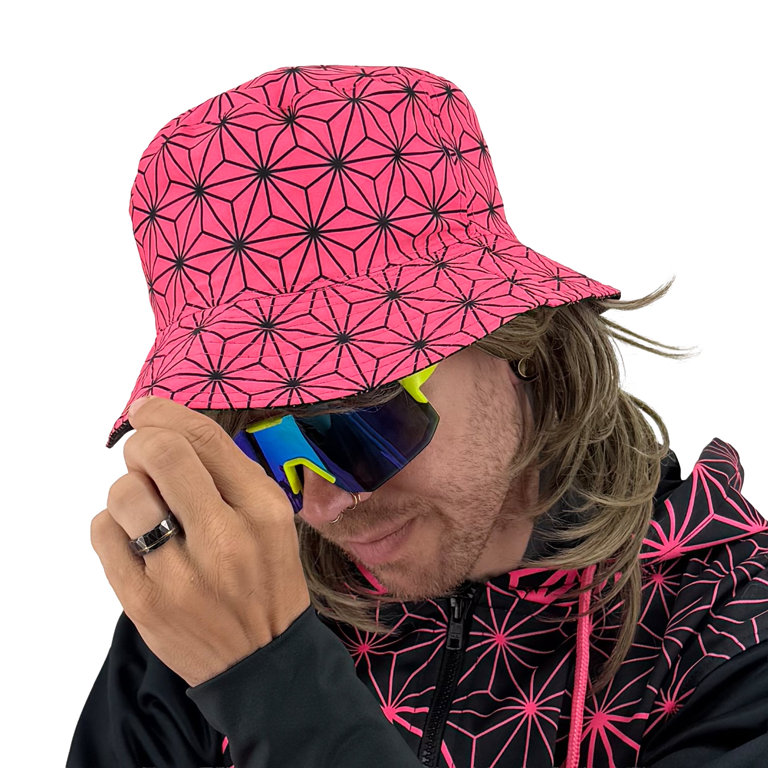 Asanoha pink UV bucket hat by First Earth – glowing sacred geometry rave hat that shines under blacklight, lightweight and perfectly portable for festival adventure 