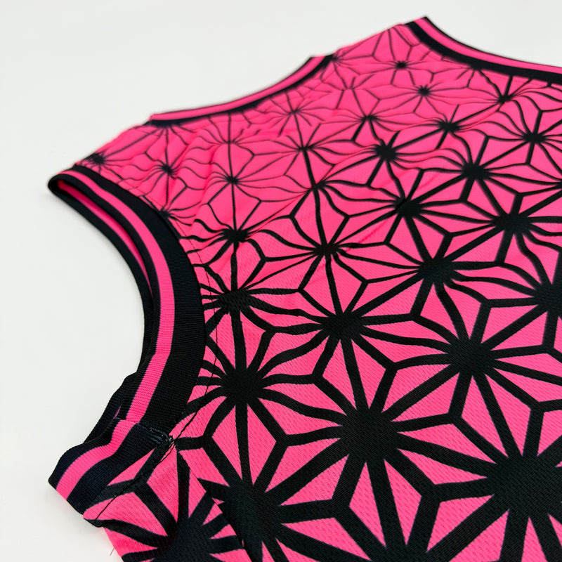 Asanoha pink UV basketball jersey by First Earth – lightweight mesh rave jersey with sacred geometry design that glows under blacklight 