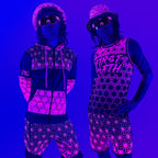 Asanoha pink UV apparel set by First Earth – rave-ready collection featuring matching jerseys, hoodie, hat, shorts, and joggers with glowing sacred geometry design that shines under blacklight