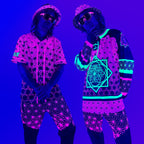 Asanoha pink UV apparel by First Earth – rave-ready collection including hoodies, jerseys, joggers, and hats with glowing sacred geometry design that shines under blacklight