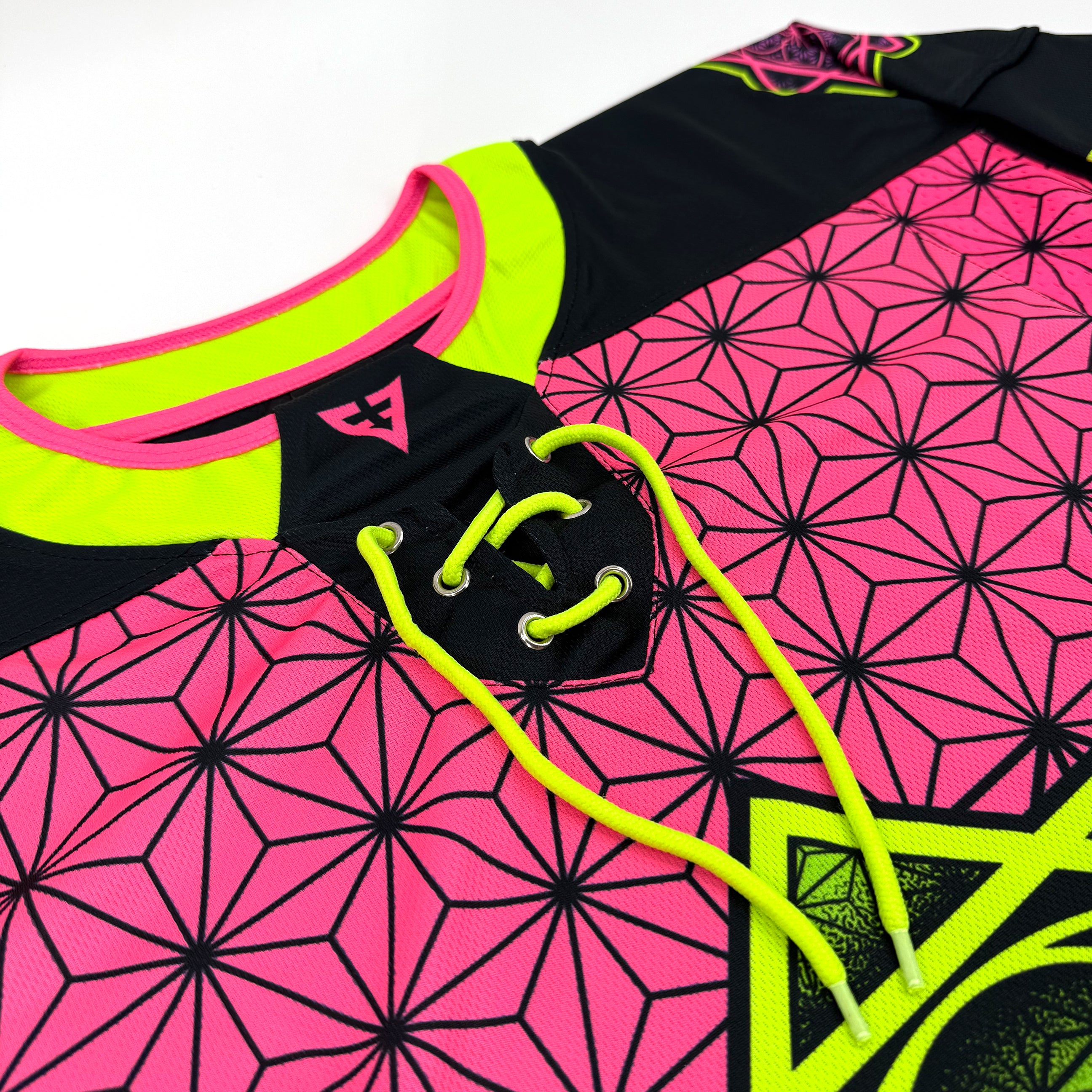 Flower of Life UV pink hockey jersey by First Earth – oversized rave jersey with sacred geometry Flow Star design that glows under blacklight