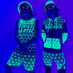 Asanoha yellow UV apparel set by First Earth – rave-ready collection featuring matching jerseys, hoodie, hat, shorts, and joggers with glowing sacred geometry design that shines under blacklight