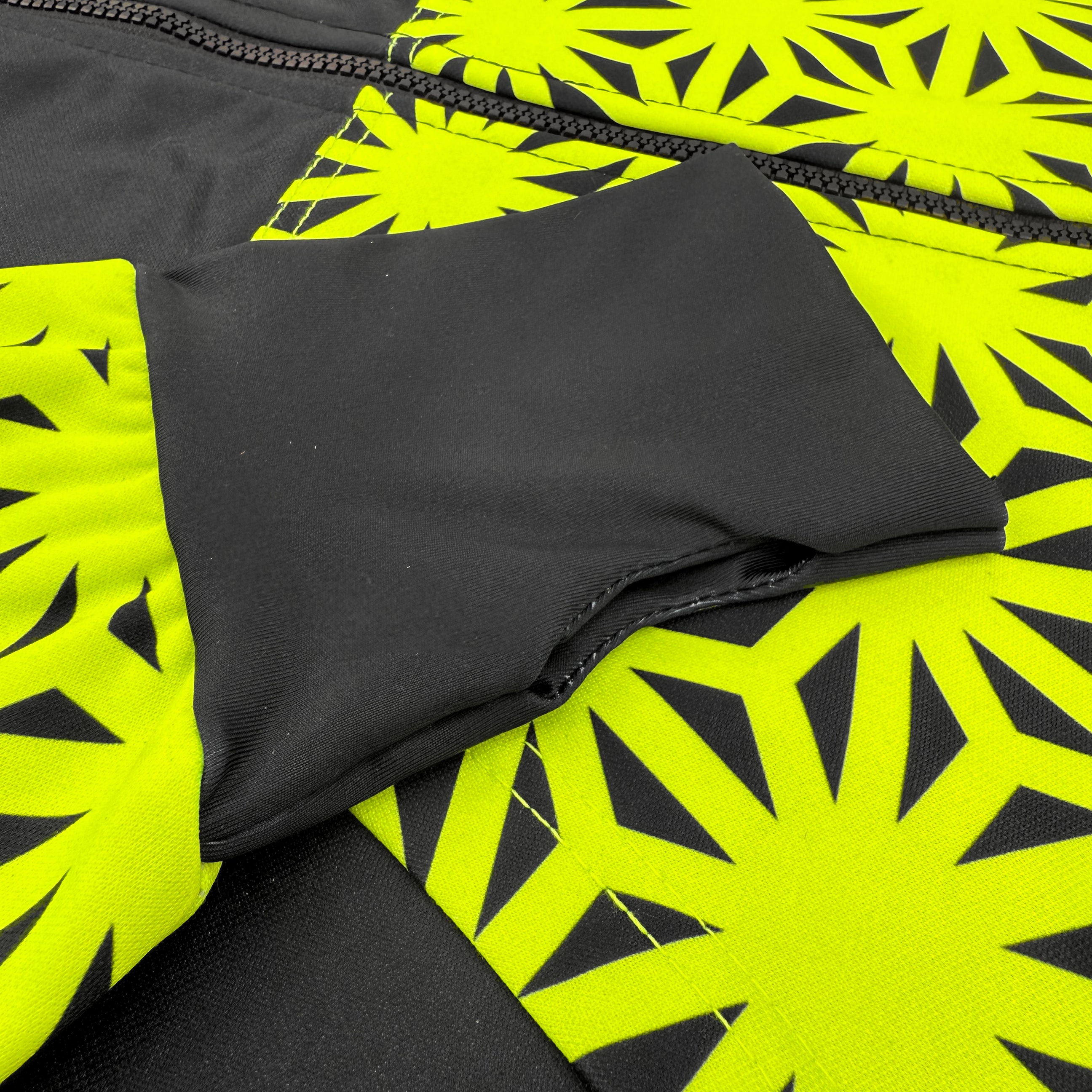 Asanoha yellow UV zip‑up hoodie by First Earth – rave-ready hoodie with glowing sacred geometry design under blacklight, thumb holes, and relaxed scoop hem for comfortable layering 