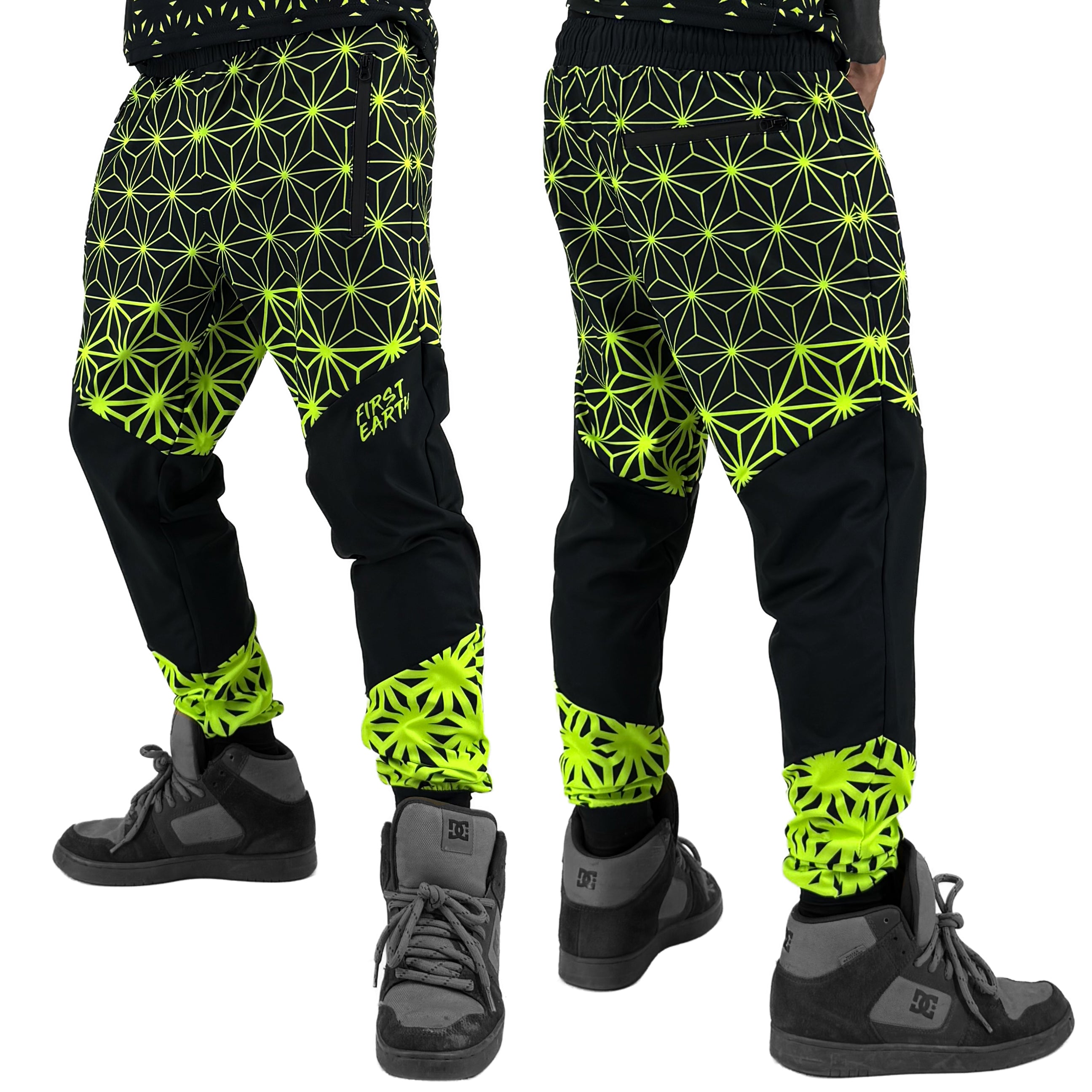 Asanoha yellow UV joggers by First Earth – rave-ready pants with glowing Asanoha sacred geometry, soft breathable polyester, zip pockets, and comfortable elastic waistband 