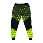 Asanoha yellow UV joggers by First Earth – rave-ready pants with glowing Asanoha sacred geometry, soft breathable polyester, zip pockets, and comfortable elastic waistband 