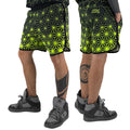 Asanoha yellow UV shorts by First Earth – rave-ready shorts featuring glowing sacred geometry design under blacklight, lightweight and breathable with practical pockets
