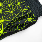 Asanoha yellow UV shorts by First Earth – rave-ready shorts featuring glowing sacred geometry design under blacklight, lightweight and breathable with practical pockets