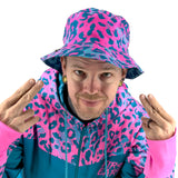 Neon Cheetah UV rave bucket hat with bold print that glows under blacklight at festivals