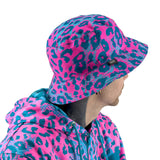 Neon Cheetah UV rave bucket hat with bold print that glows under blacklight at festivals