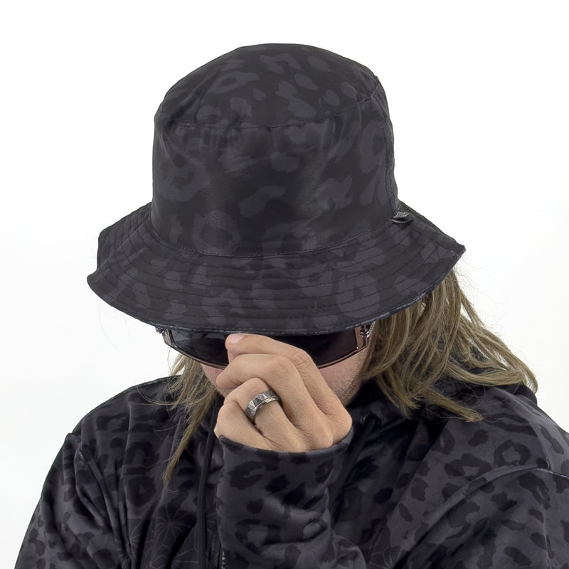 First Earth Midnight Cheetah velvet bucket hat back view on model showing leopard print crown