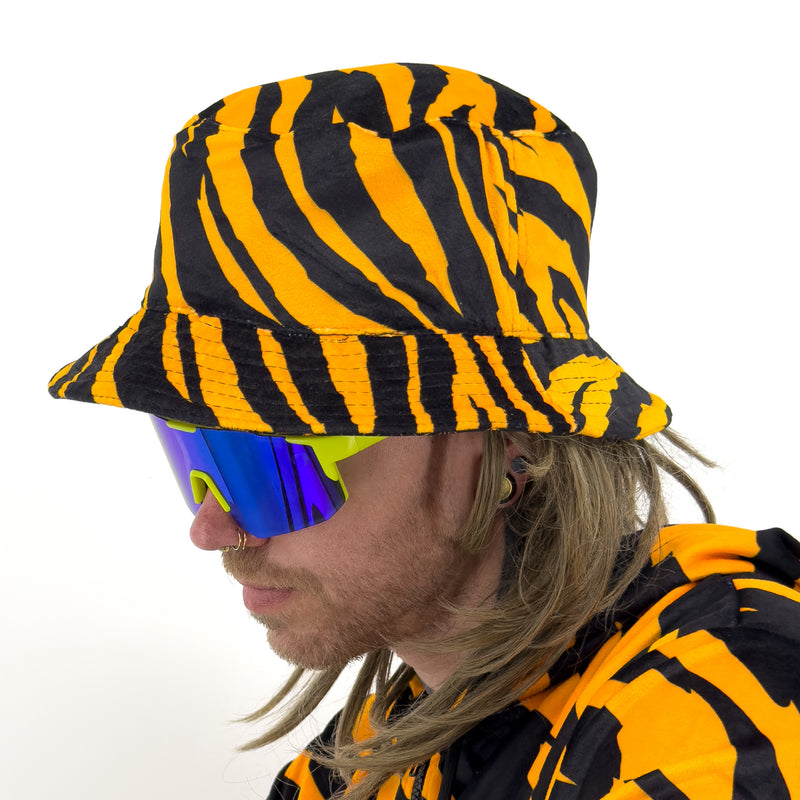 First Earth Sacred Stripes UV velvet bucket hat side profile showing orange black tiger stripe print
