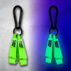 Neon green First Earth Flow Star carabiner shown in daylight and glowing under blacklight