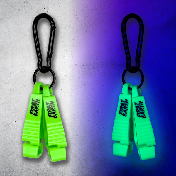 Neon green First Earth Flow Star carabiner shown in daylight and glowing under blacklight
