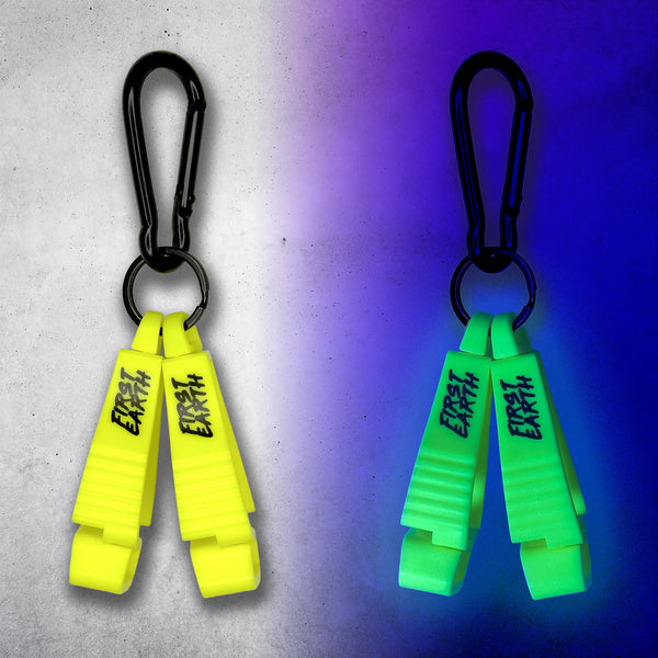 Neon yellow First Earth Flow Star carabiner shown in daylight and glowing green under blacklight