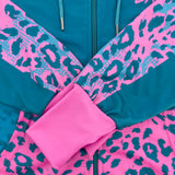 Neon Cheetah UV rave zip up hoodie with bold print that glows under blacklight at festivals