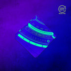 Celestial Compass - UV Glow - Bandana glowing under black light, showing the UV-reactive colors and complete printed design