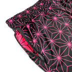 Close up of First Earth Asanoha Pink UV velvet harem joggers hip zipper pocket