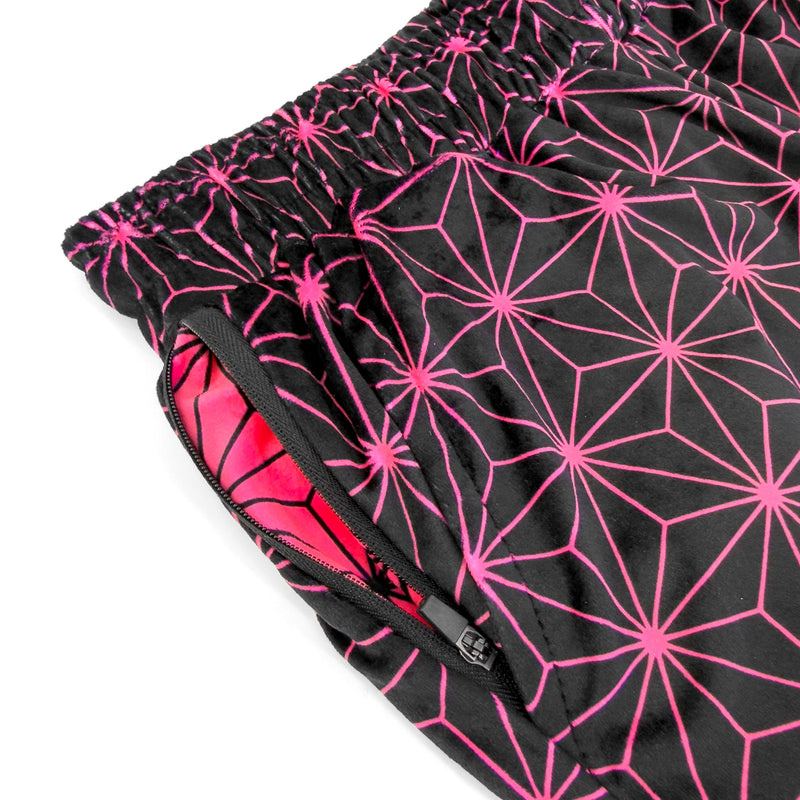 Close up of First Earth Asanoha Pink UV velvet harem joggers hip zipper pocket