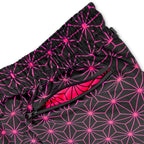 Close up of First Earth Asanoha Pink UV velvet harem joggers back zipper pocket