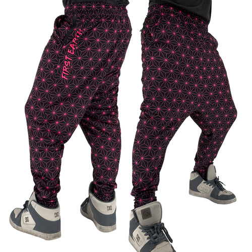 First Earth Asanoha Pink velvet harem joggers on model showing front and back views with pink geometric asanoha pattern