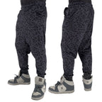 First Earth Midnight Cheetah velvet harem joggers on model showing front and back views with dark cheetah print