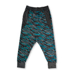 First Earth Shadow velvet harem joggers front with teal, grey, and black striped pattern