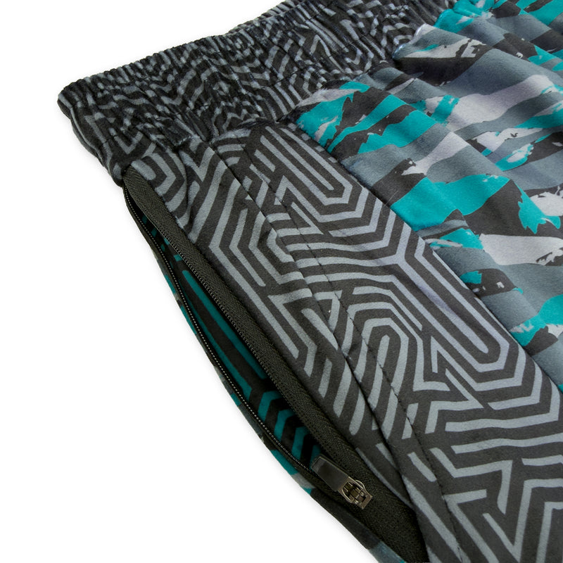 Close up of First Earth Shadow velvet harem joggers hip zipper pocket
