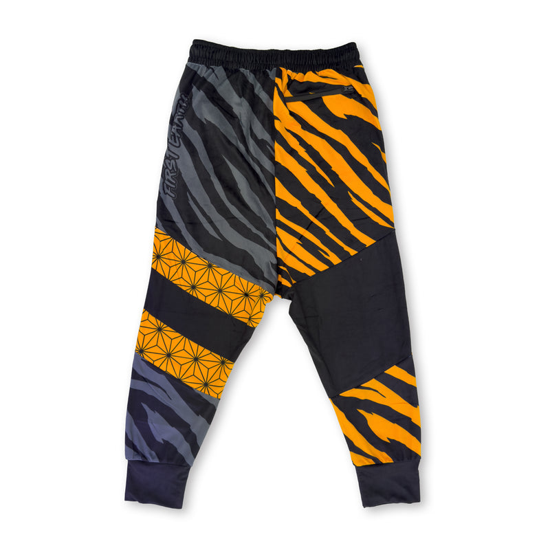 First Earth Sacred Stripes UV velvet harem joggers back with orange and gray tiger stripe design