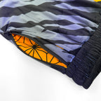 Close up of First Earth Sacred Stripes UV velvet harem joggers hip zipper pocket
