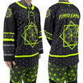 Model wearing First Earth UV green and grey asanoha hockey jersey showing front and back Flow Star graphics