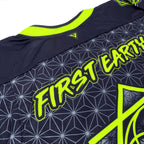 Close-up of the back neckline on First Earth UV green and grey asanoha hockey jersey with First Earth logo