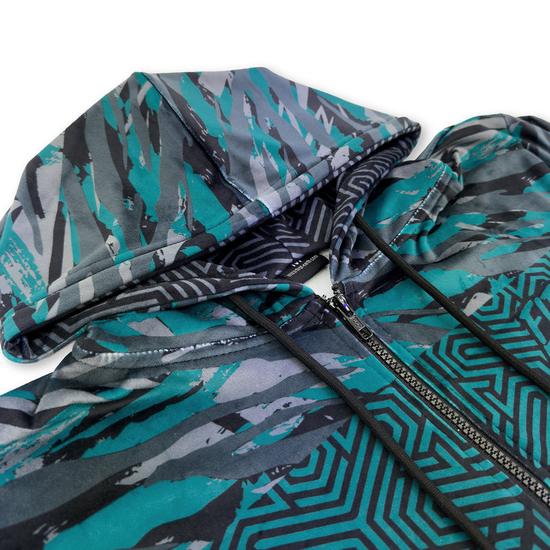 First Earth Shadow velvet hoodie close up showing hood, zipper, drawstrings, and soft fabric