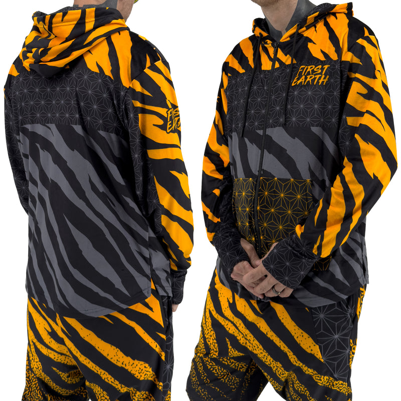 First Earth Sacred Stripes UV zip hoodie on model showing front and back views with orange tiger stripe design