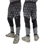 Asanoha Grey UV rave joggers with sacred Japanese geometry that glows under blacklight at festivals