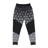 Asanoha Grey UV rave joggers with sacred Japanese geometry that glows under blacklight at festivals