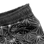 Asanoha Grey UV rave joggers with sacred Japanese geometry that glows under blacklight at festivals