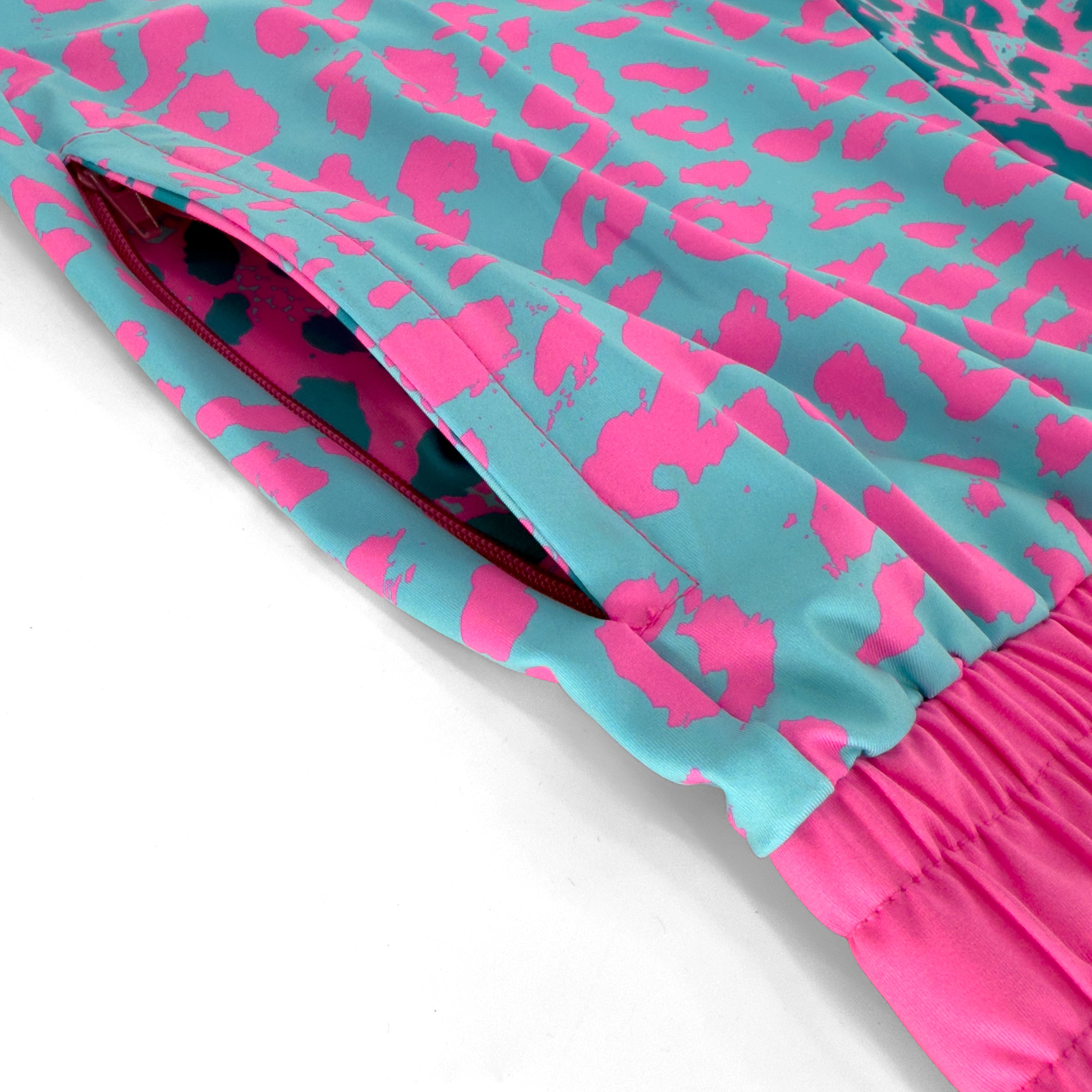 Neon Cheetah UV rave joggers with bold animal print that glows under blacklight for festivals