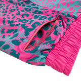 Neon Cheetah UV rave joggers with bold animal print that glows under blacklight for festivals
