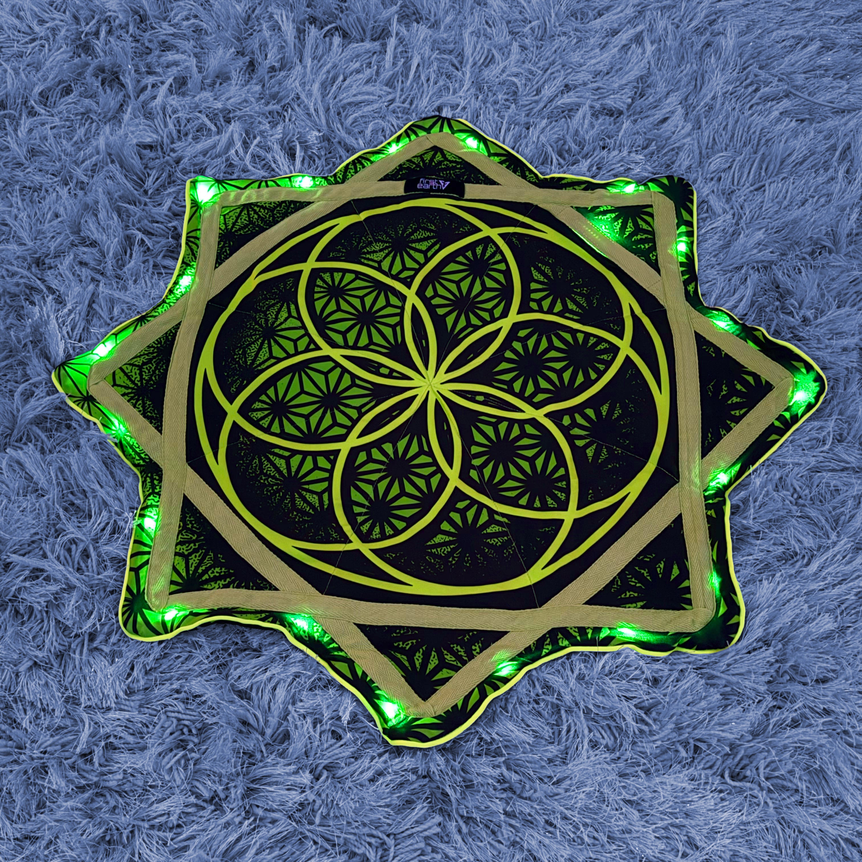 Flower of Life – UV green LED spinning flow star by First Earth, luminous rave prop with sacred geometry 