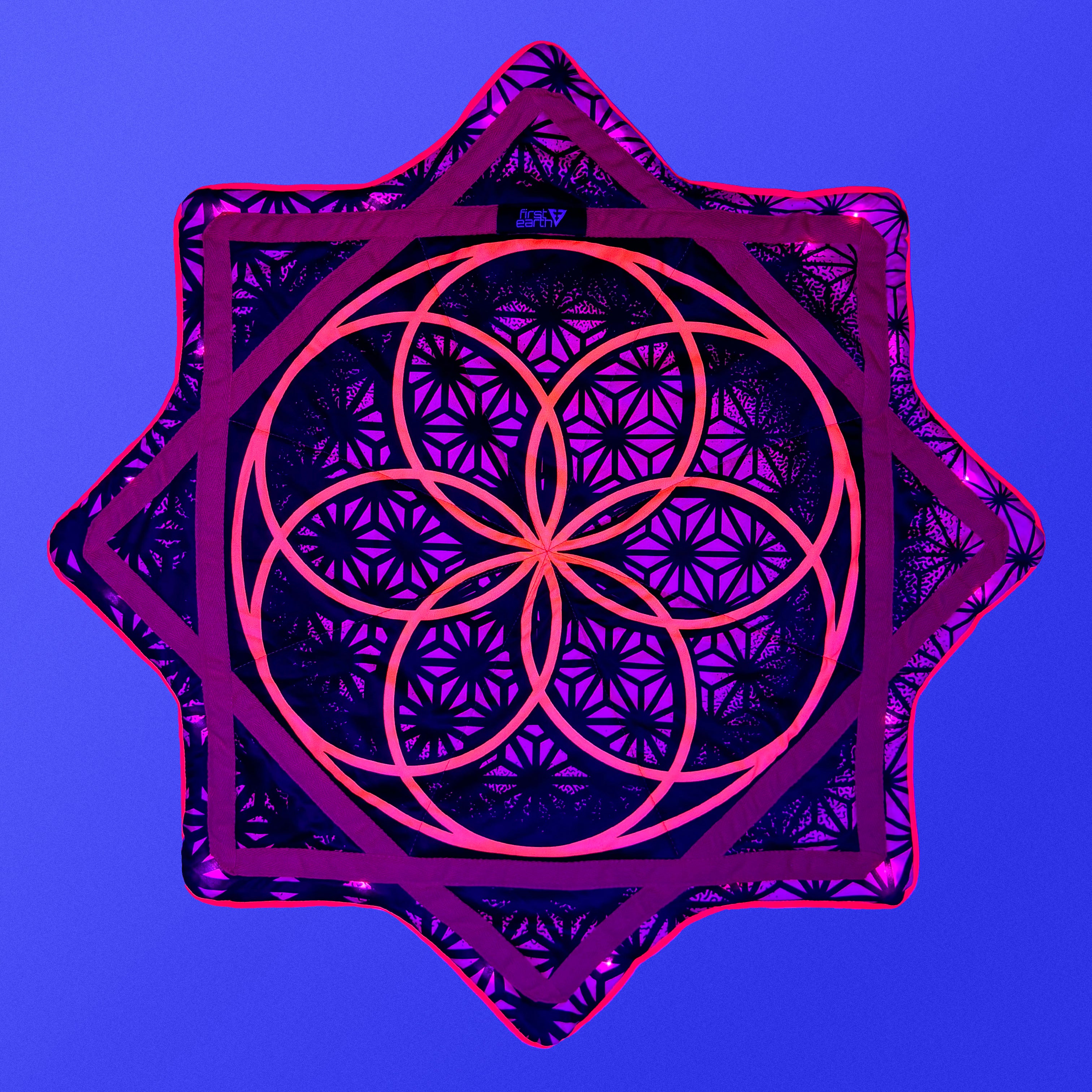 Flower of Life – UV pink LED spinning flow star by First Earth, luminous rave prop with sacred geometry 