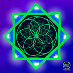 Flower of Life - LED Flow Star by First Earth, nighttime view showing the bright LED pattern and complete Flow Star design