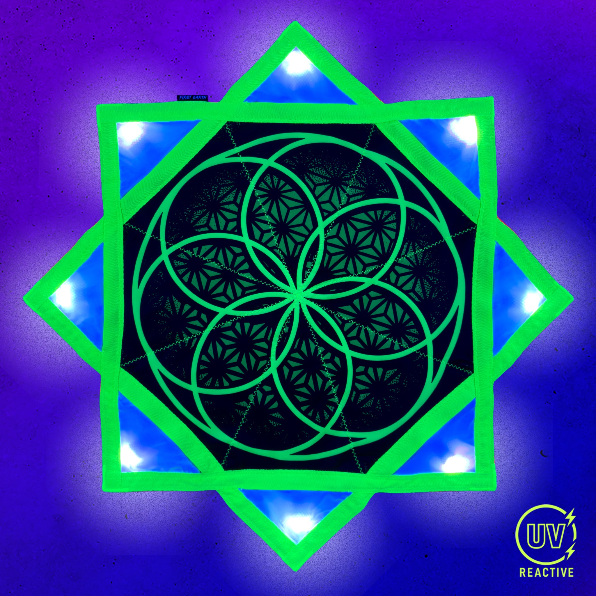 Flower of Life - LED Flow Star by First Earth, nighttime view showing the bright LED pattern and complete Flow Star design