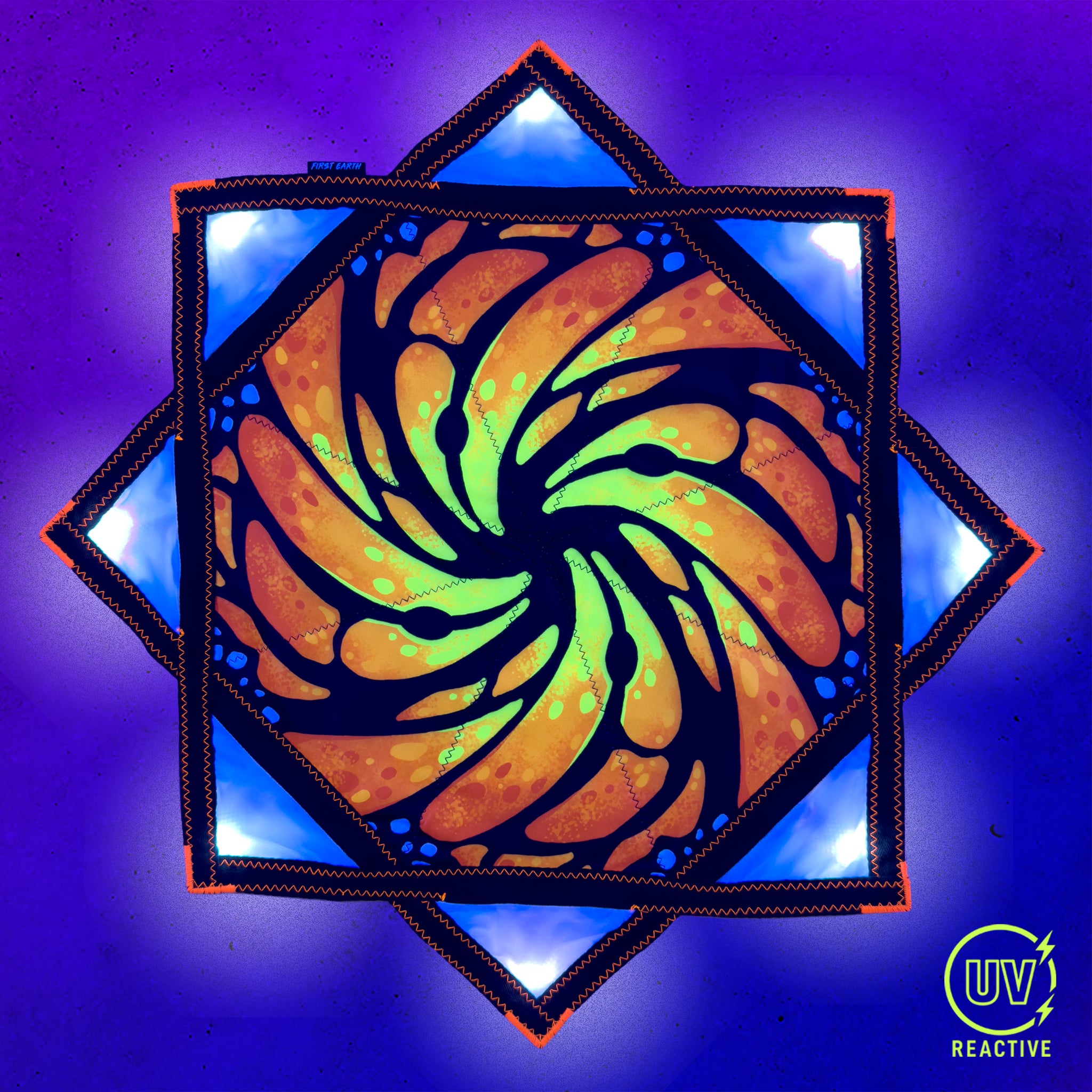 Liquid Butterfly Juice - LED Flow Star, nighttime view showing the bright LED pattern and complete Flow Star design